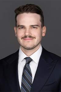 headshot of Ethan Adams
