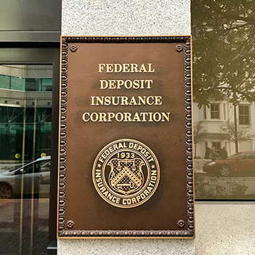 Building plaque identifying Federal Deposit Insurance Corporation